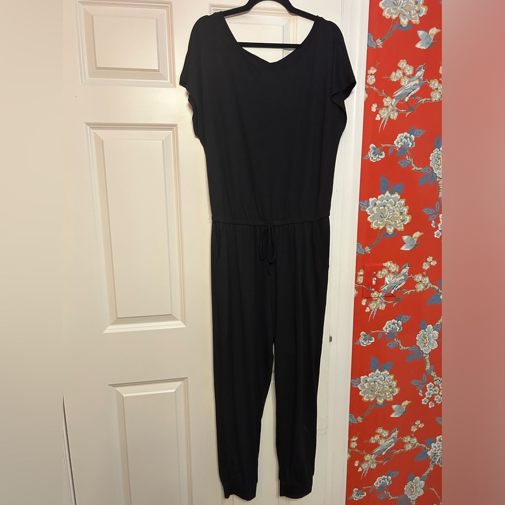Black jumpsuit, super comfy!  Great for travel!  Cute with Jean jacket.  Size L